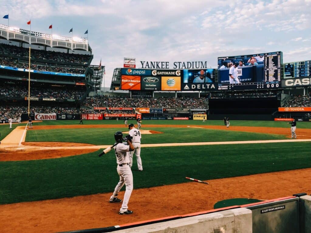 Yankees player walking up to the batter's box at Yankee Stadium