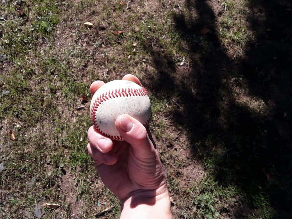 Bottom view of a hand demonstrating how to grip a four-seam fastball