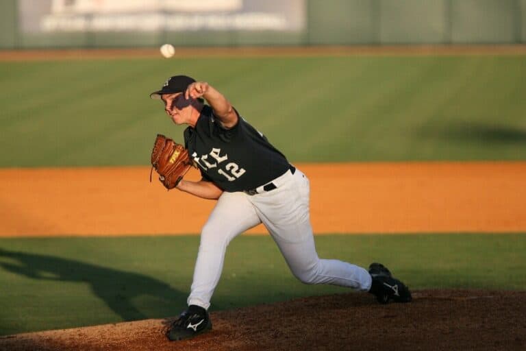 A left-handed pitcher from Rice delivers a pitch from the mound
