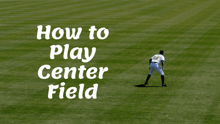 Backside view of a center fielder in the ready position with overlaying text that reads "How to Play Center Field"