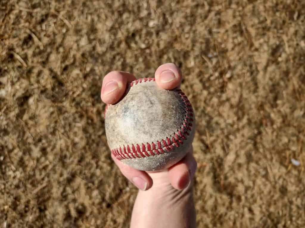 Bottom view of a hand demonstrating how to grip a four-seam fastball