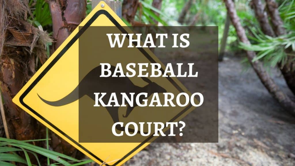 A yellow sign with an image of a kangaroo and overlaying text that reads "What is Baseball Kangaroo Court?"