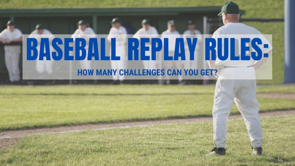 Third base coach in a white uniform is standing in the grass next to the third baseline with hands on hips. The overlaying text reads "Baseball Replay Rules: How Many Challenges Can You Get"