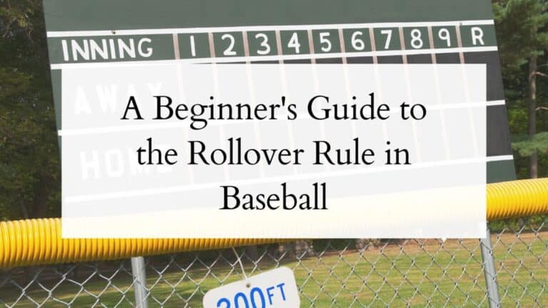 Closeup of a baseball scoreboard behind an outfield fence with overlaying text that reads "A Beginner's Guide to the Rollover Rule in Baseball"
